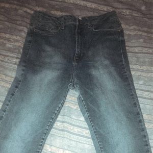 Light blue faded jeans.